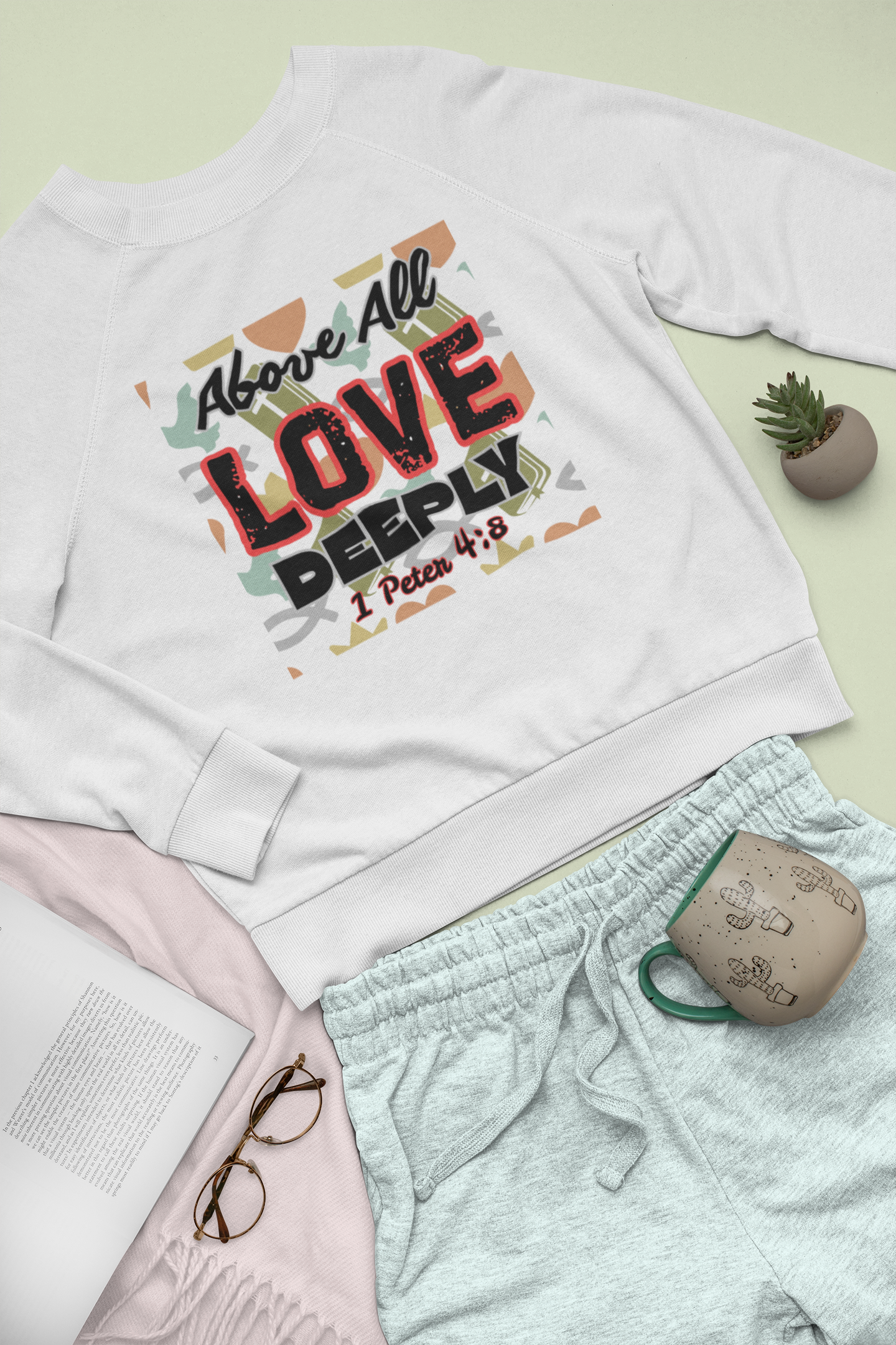 Above All Love Deeply - Unisex Sweatshirt