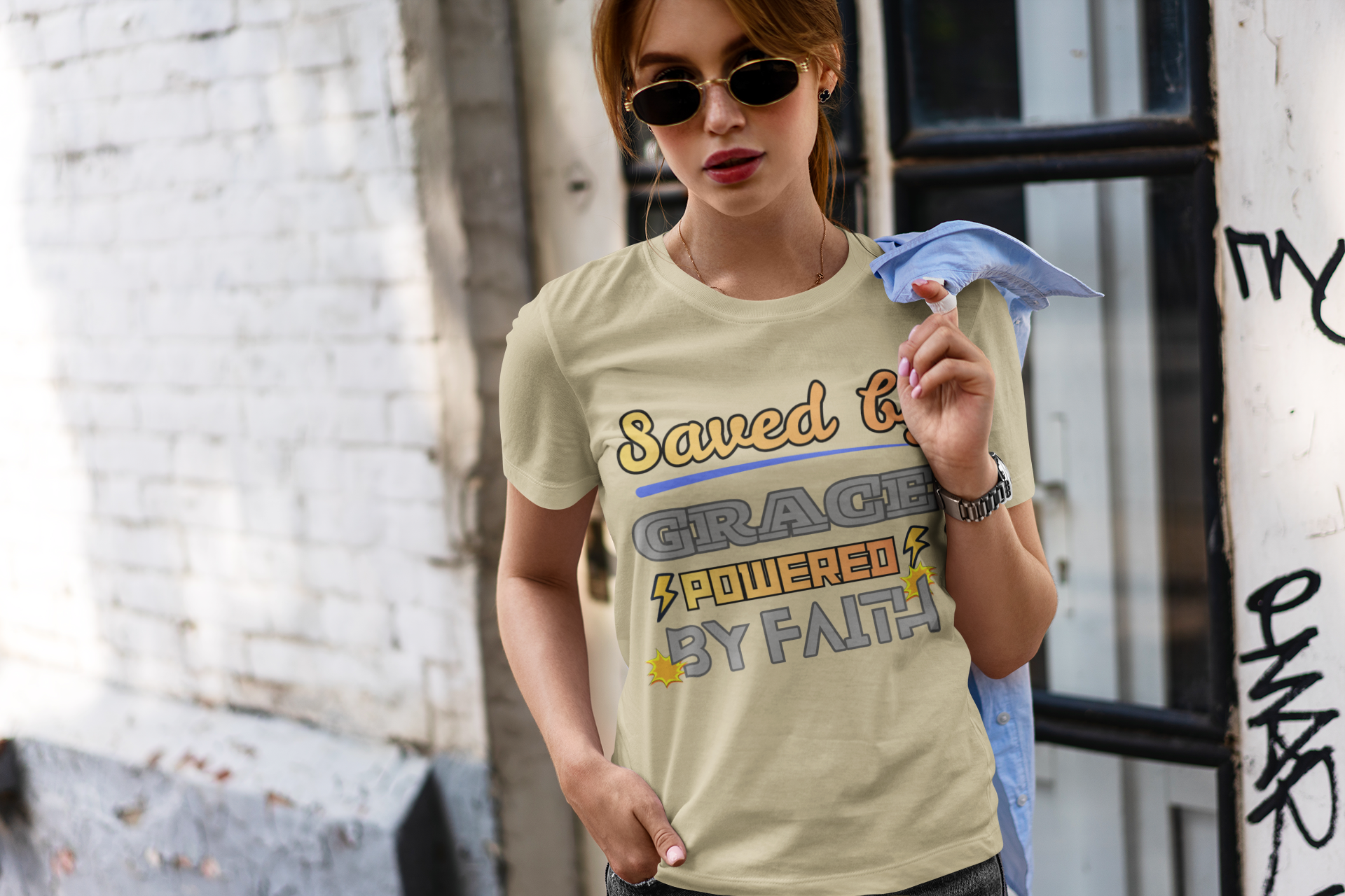 Saved by Grace Powered by Faith - Unisex Supima T-Shirt